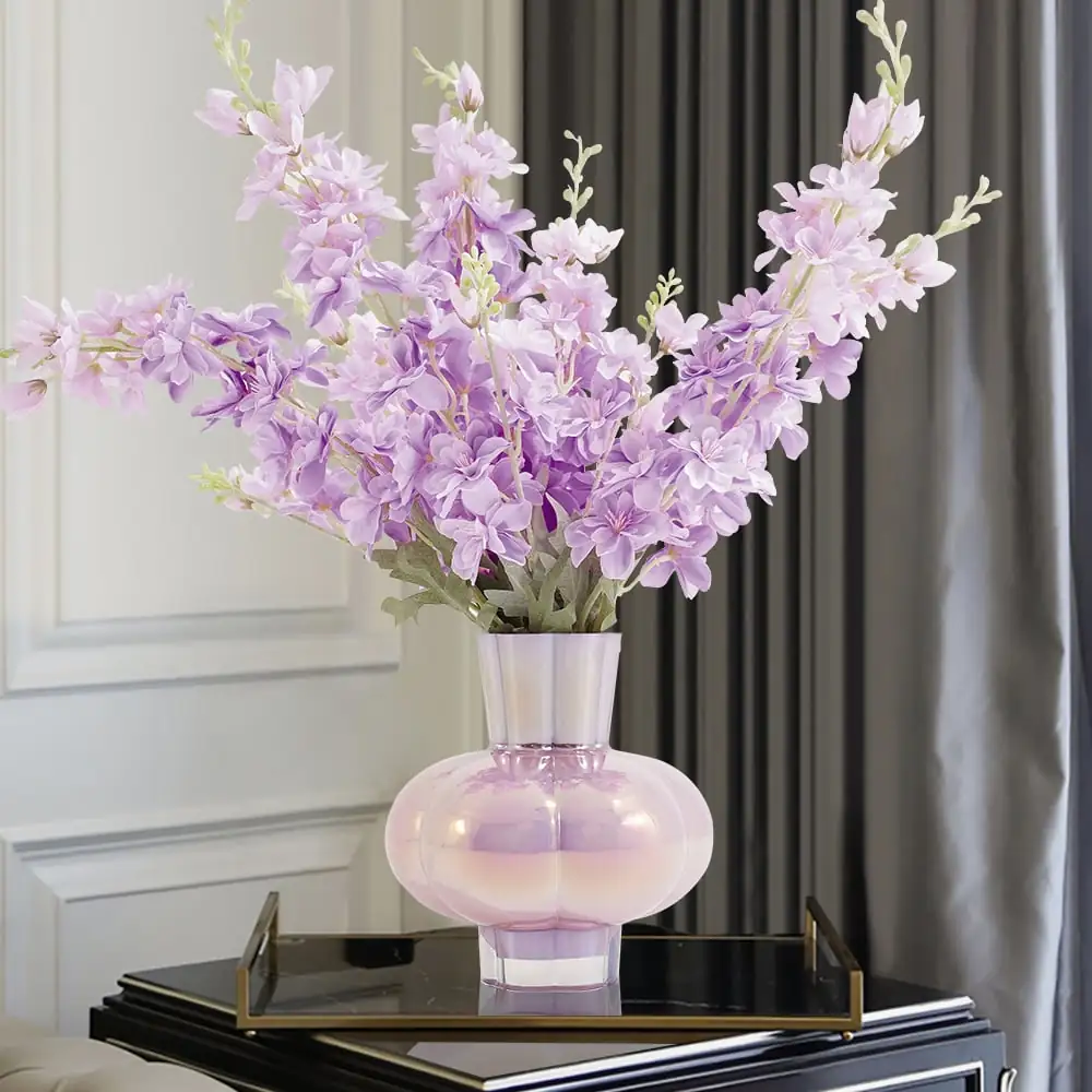 delphinium in glass vase