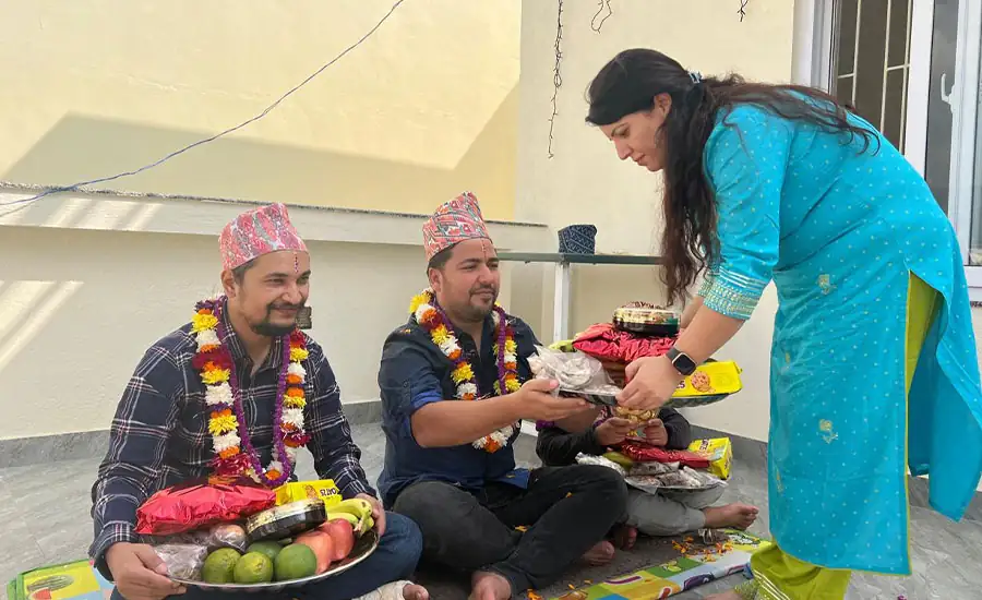 bhai tika festival with globe amaranth garlands
