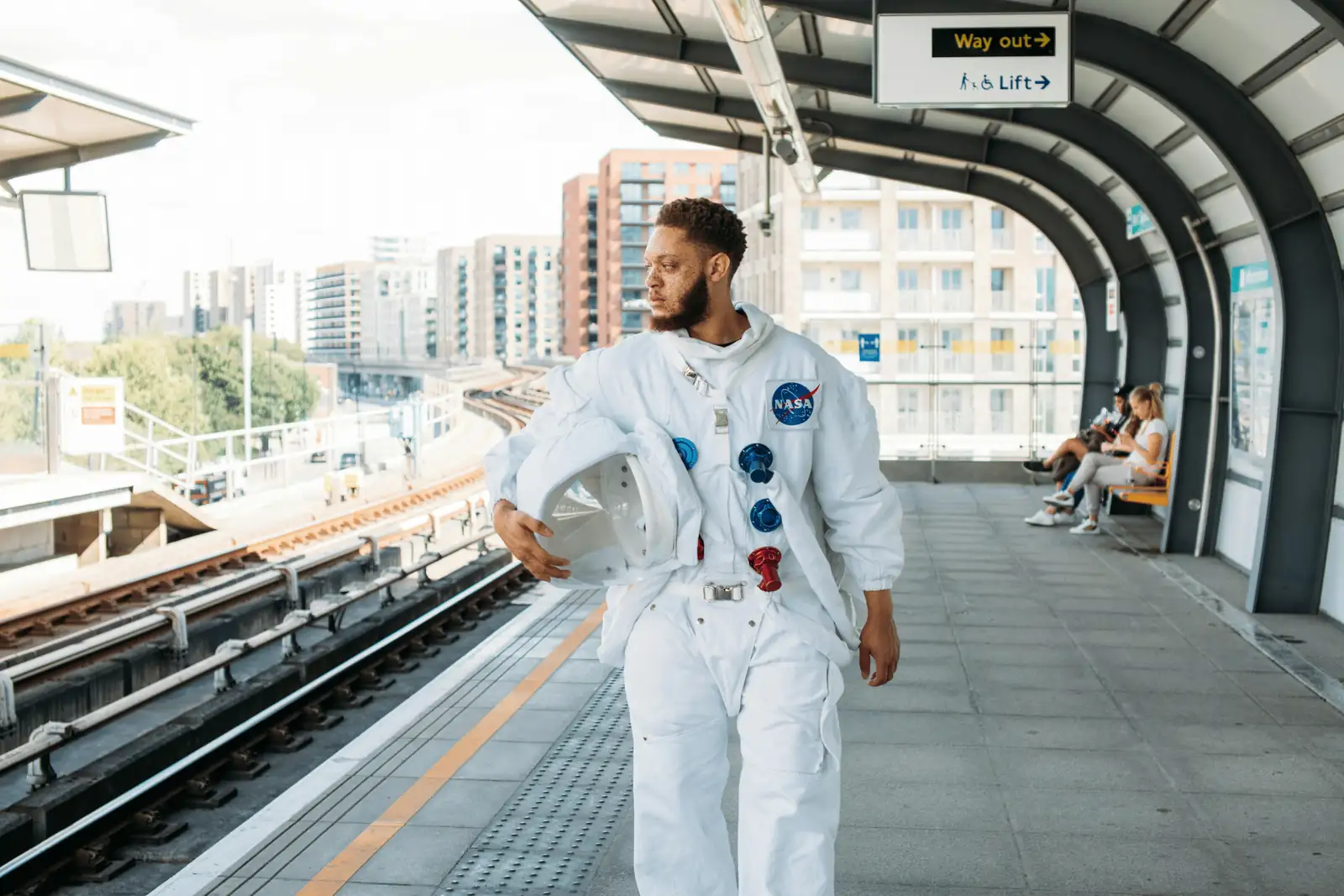 astronaut with zinnia on space station