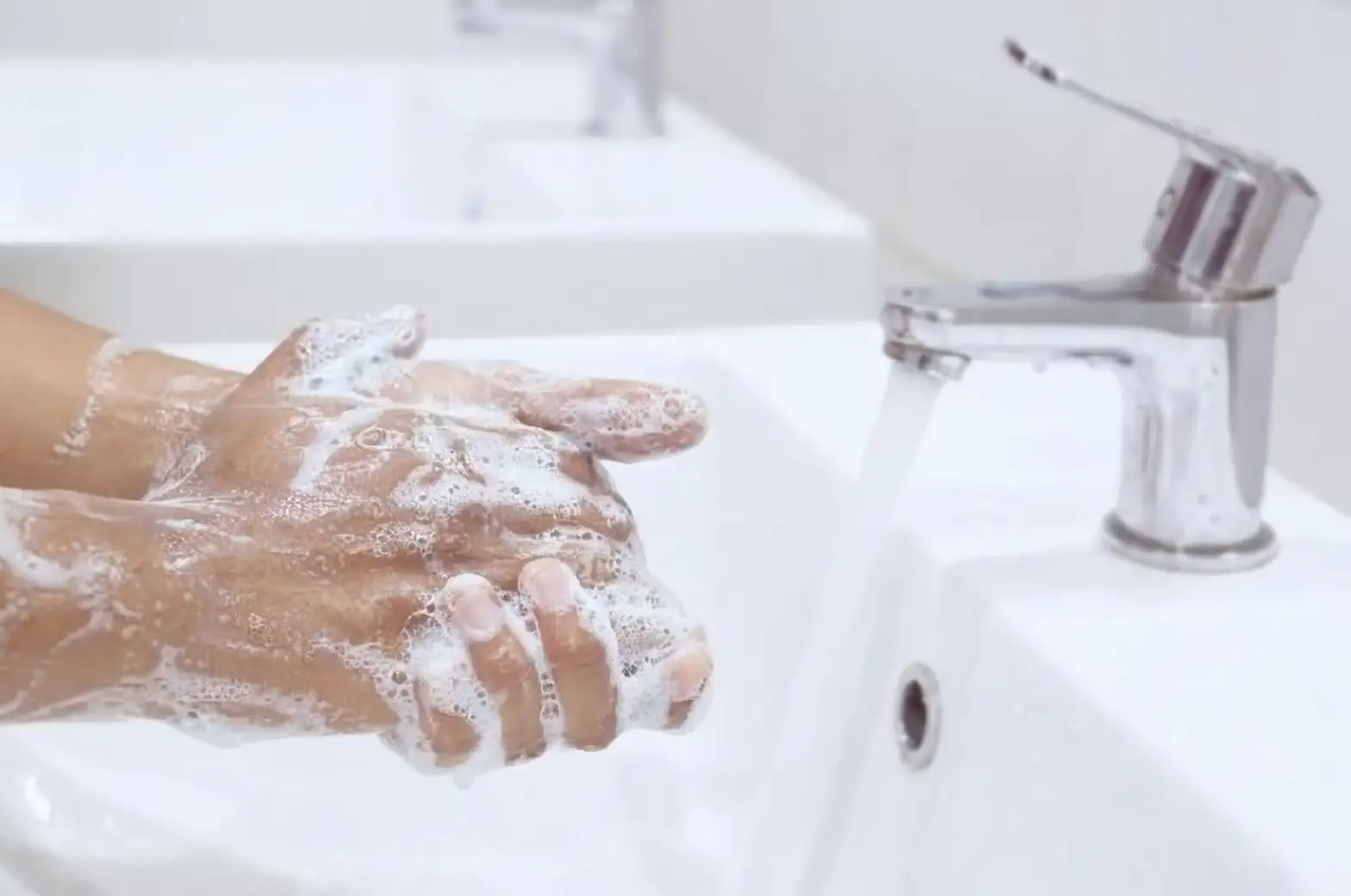 washing hands soap water