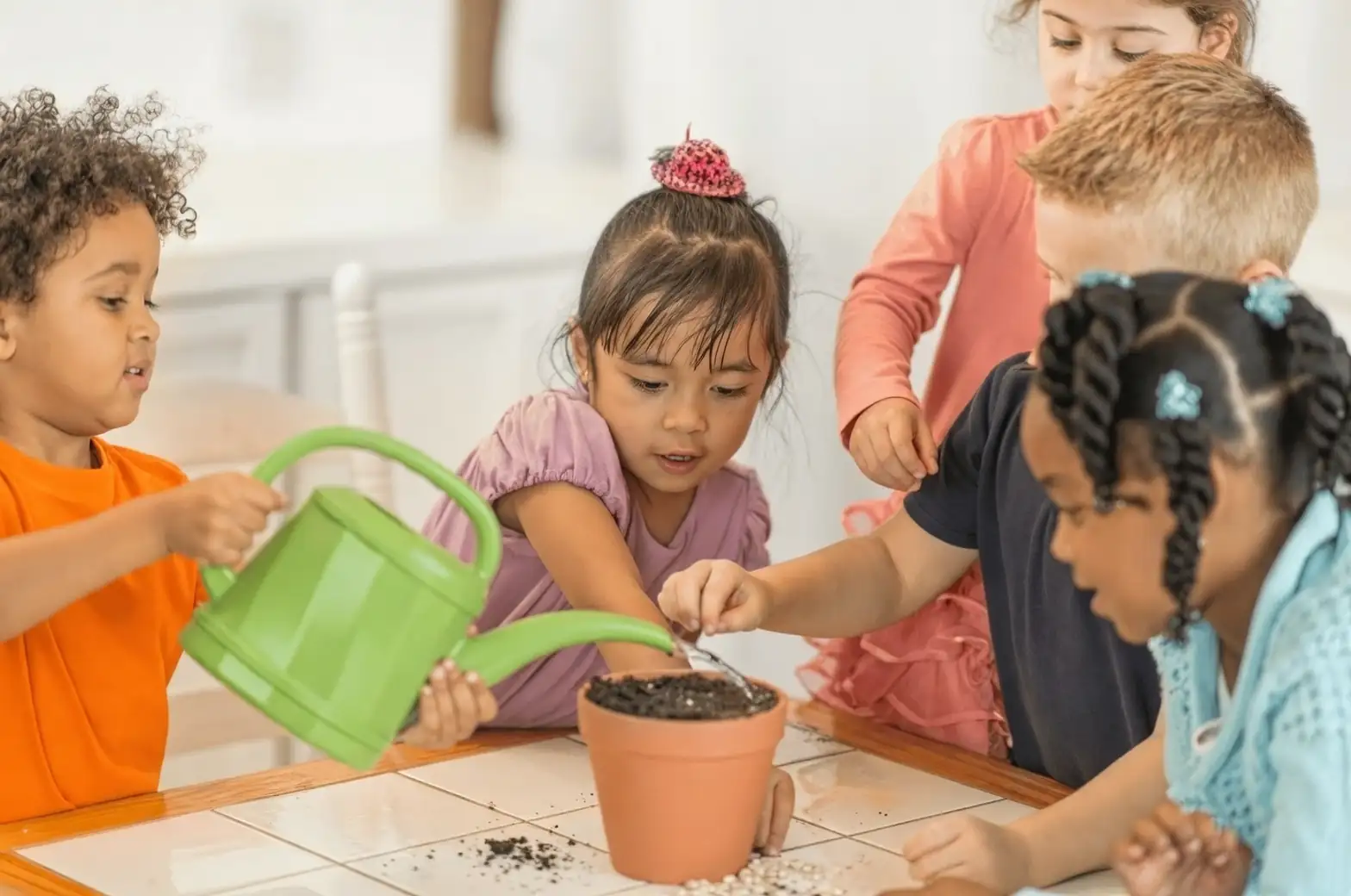 children discussing plant observations