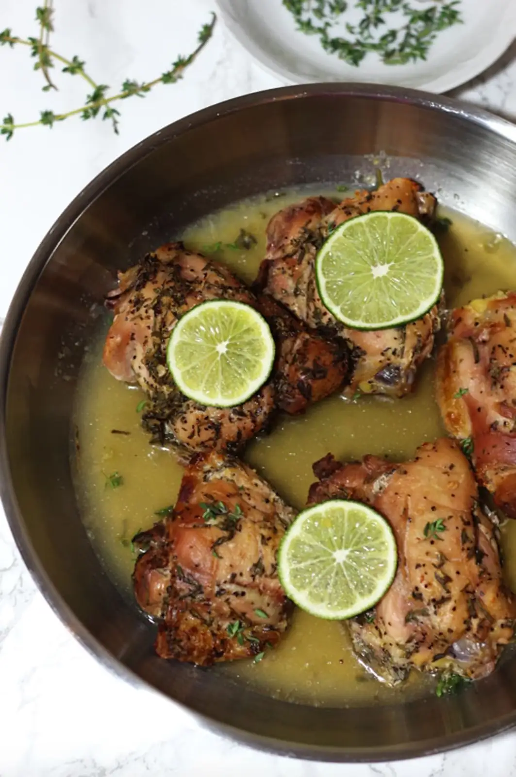 fresh thyme on roasted chicken