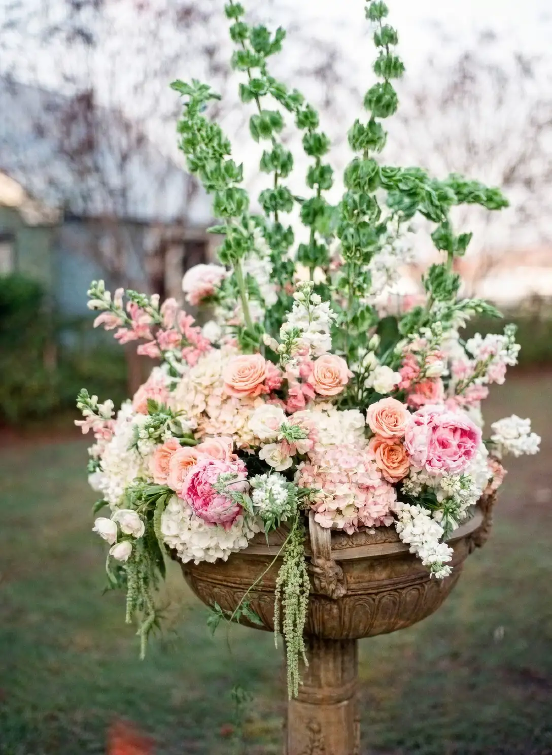 bells of ireland with colorful flowers