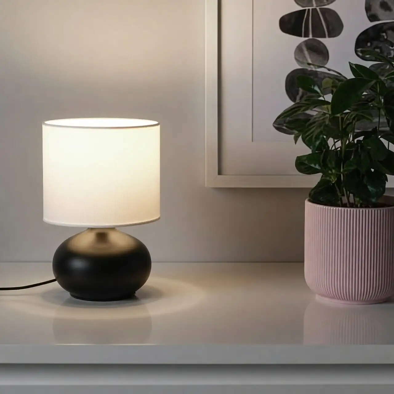 parlor palm with table lamp warm light