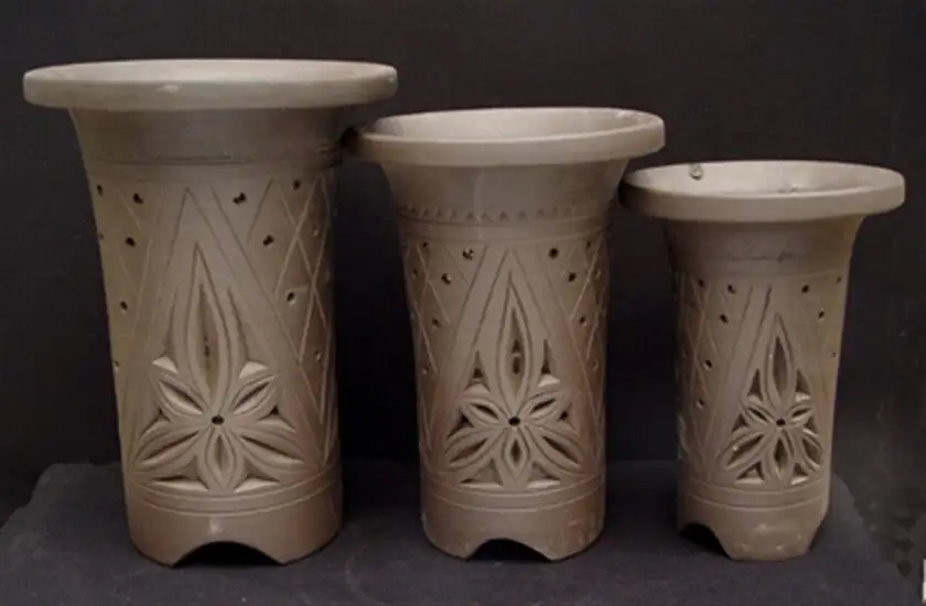 cymbidium in unglazed clay pot